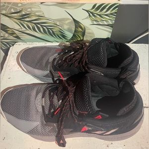 Black, red, grey, and silver adidas Dame 8 Basketball shoes. Size 12 US